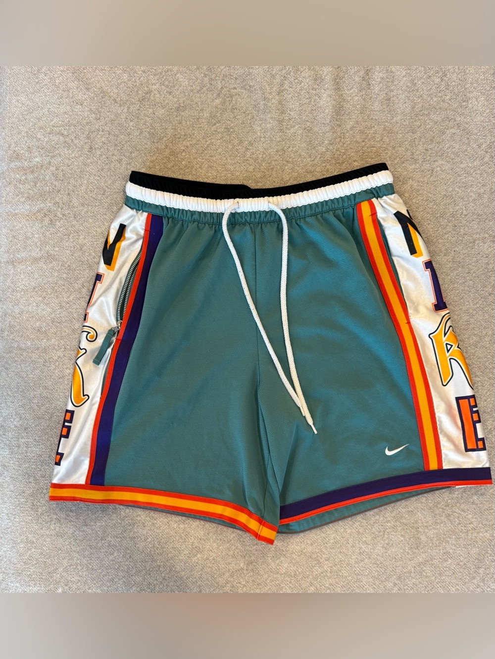 Nike Teal Basketball Shorts with Multicolor Side Panels